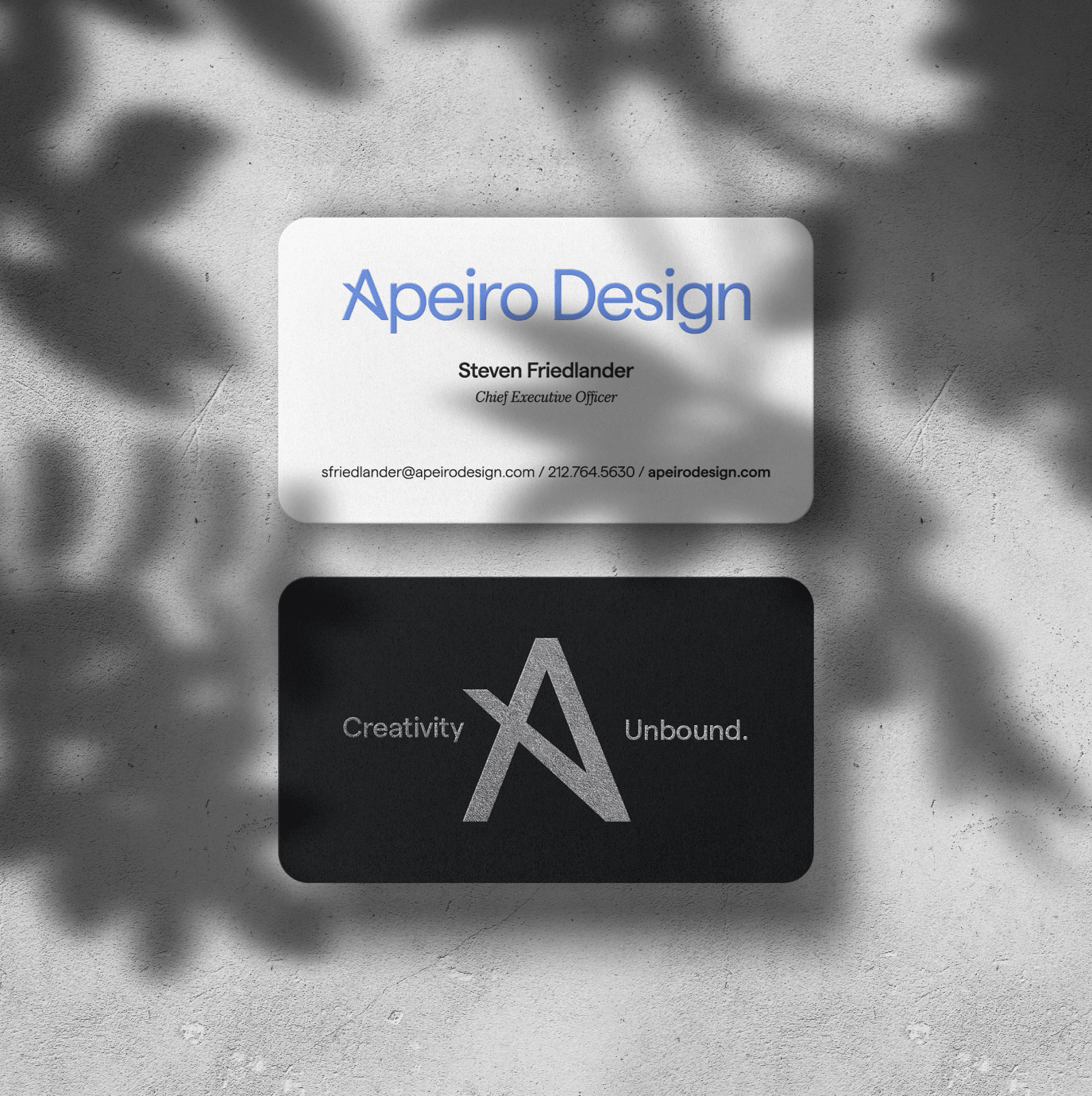 Mockup of business cards designed by Third & Arch for Apeiro's architecture firm.