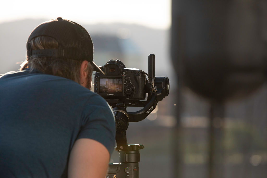 Architectural photographer shooting a tall building