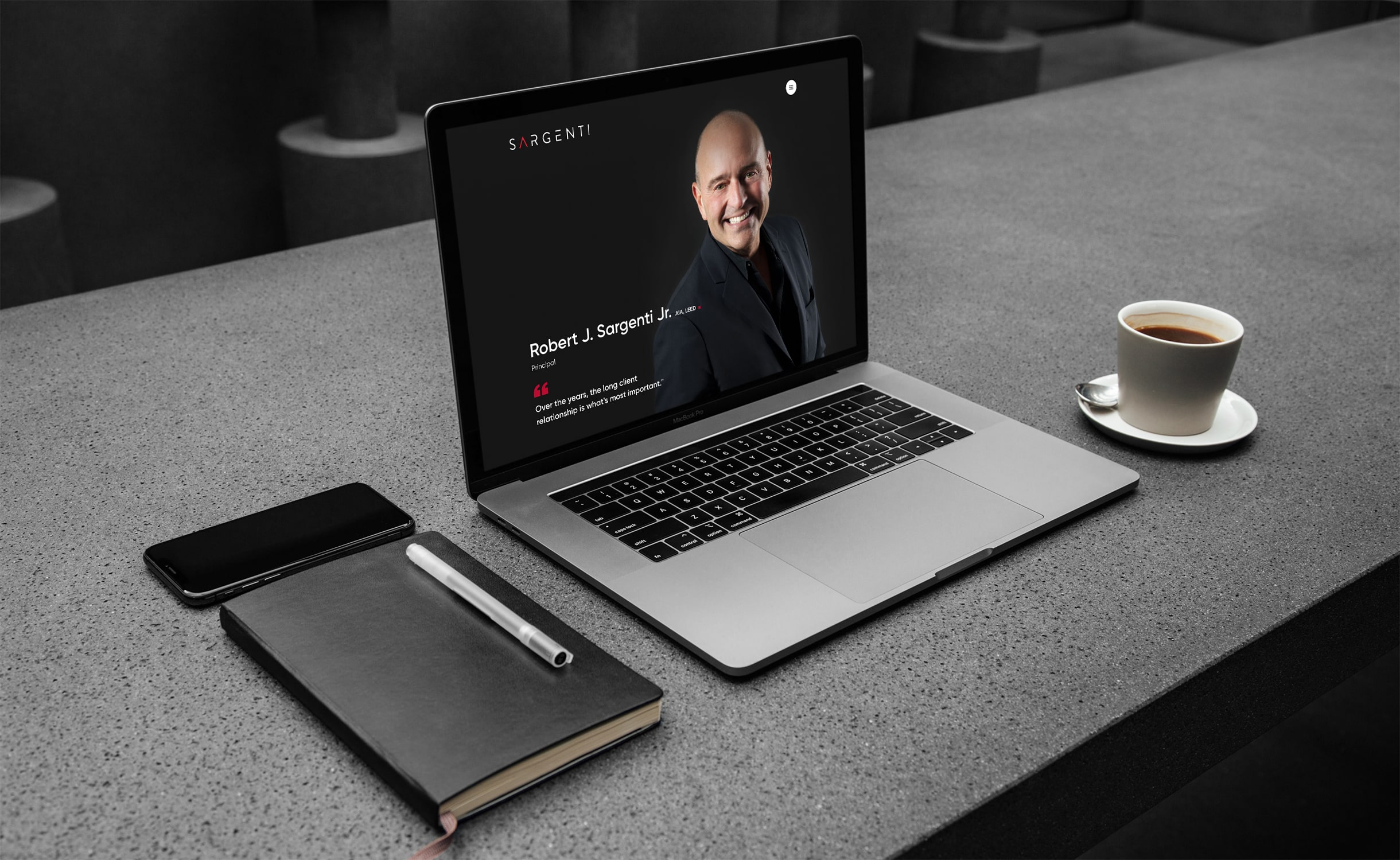 Robert J. Sargenti Jr. page mockup on a laptop for the Architecture firm website design.