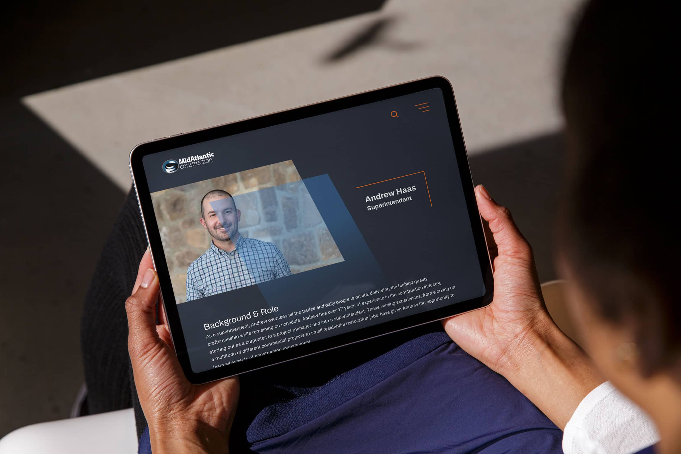 Mid Atlantic Construction Firm Bio Details on Tablet in someone hands